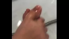 Play Hungarian Amateur Footjob in the Bathroom